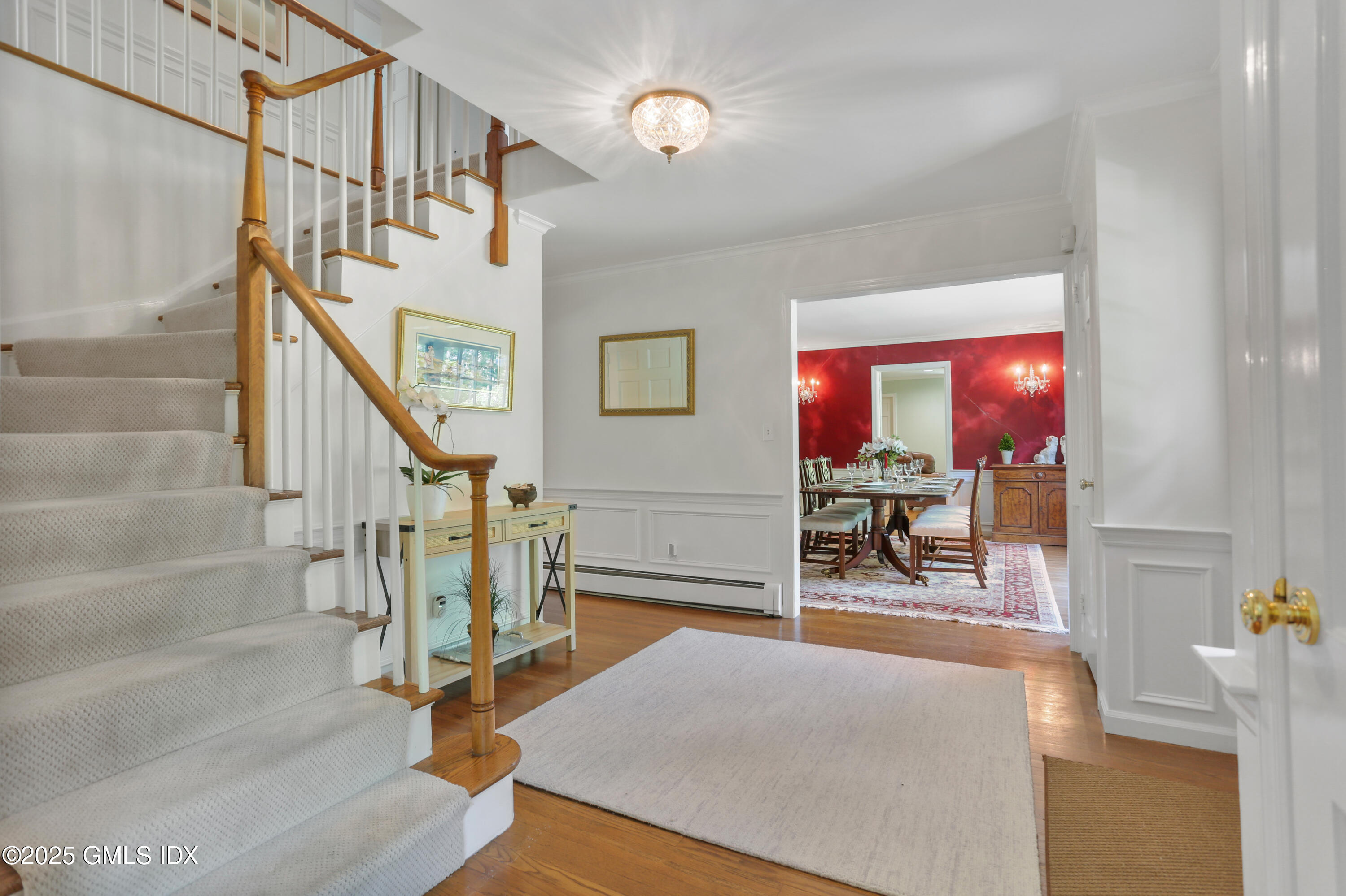 36 Horseshoe Road Cos Cob, CT 06807 - Photo 4 of 39 a living room with furniture a rug and a window