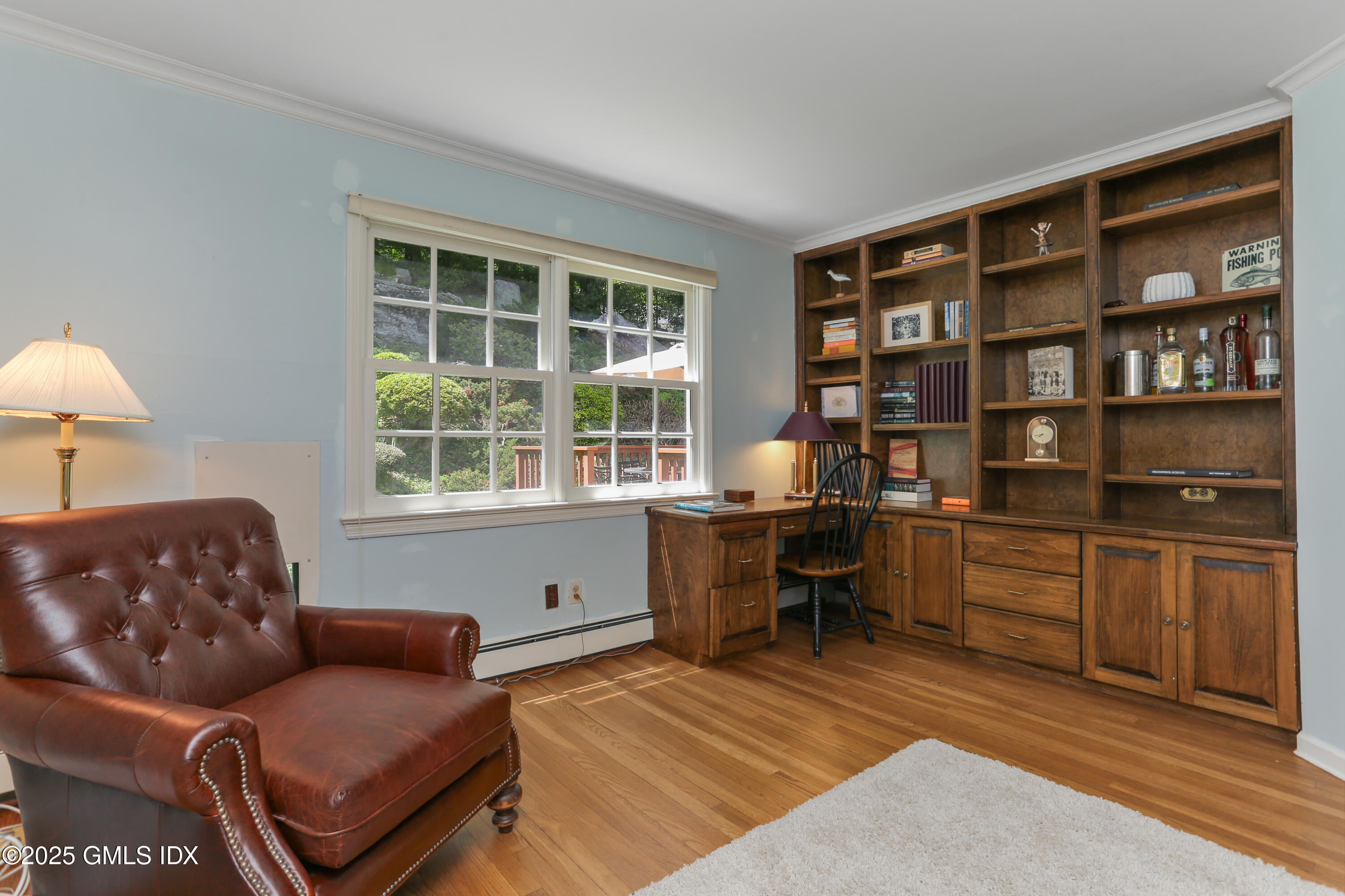 36 Horseshoe Road Cos Cob, CT 06807 - Photo 8 of 39 a livingroom with a workspace and a couch