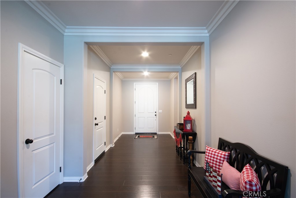 11950 Flicker Cove Corona, CA 92883 - Photo 8 of 28 a living room with furniture and wooden floor