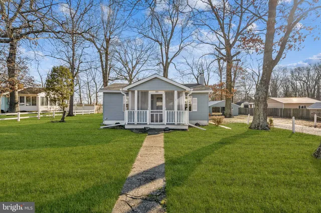 a view of a house with a big yard