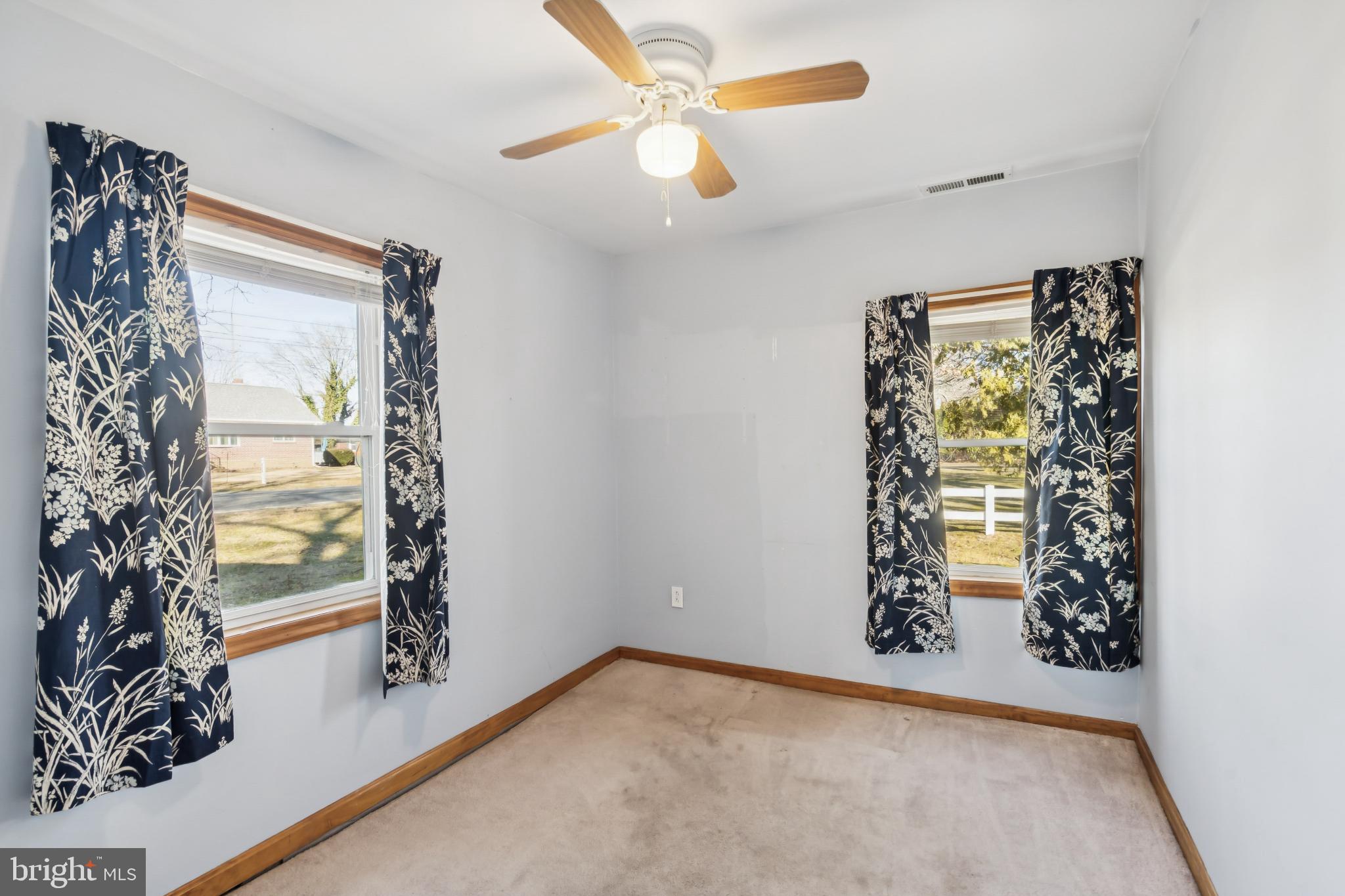255 South Woodruff Road Bridgeton, NJ 08302 - Photo 14 of 25 wooden floor in an empty room with a window