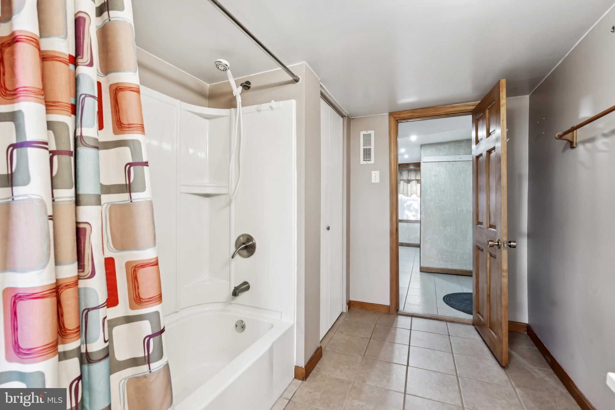 255 South Woodruff Road Bridgeton, NJ 08302 - Photo 20 of 25 a bathroom with a bathtub and a shower