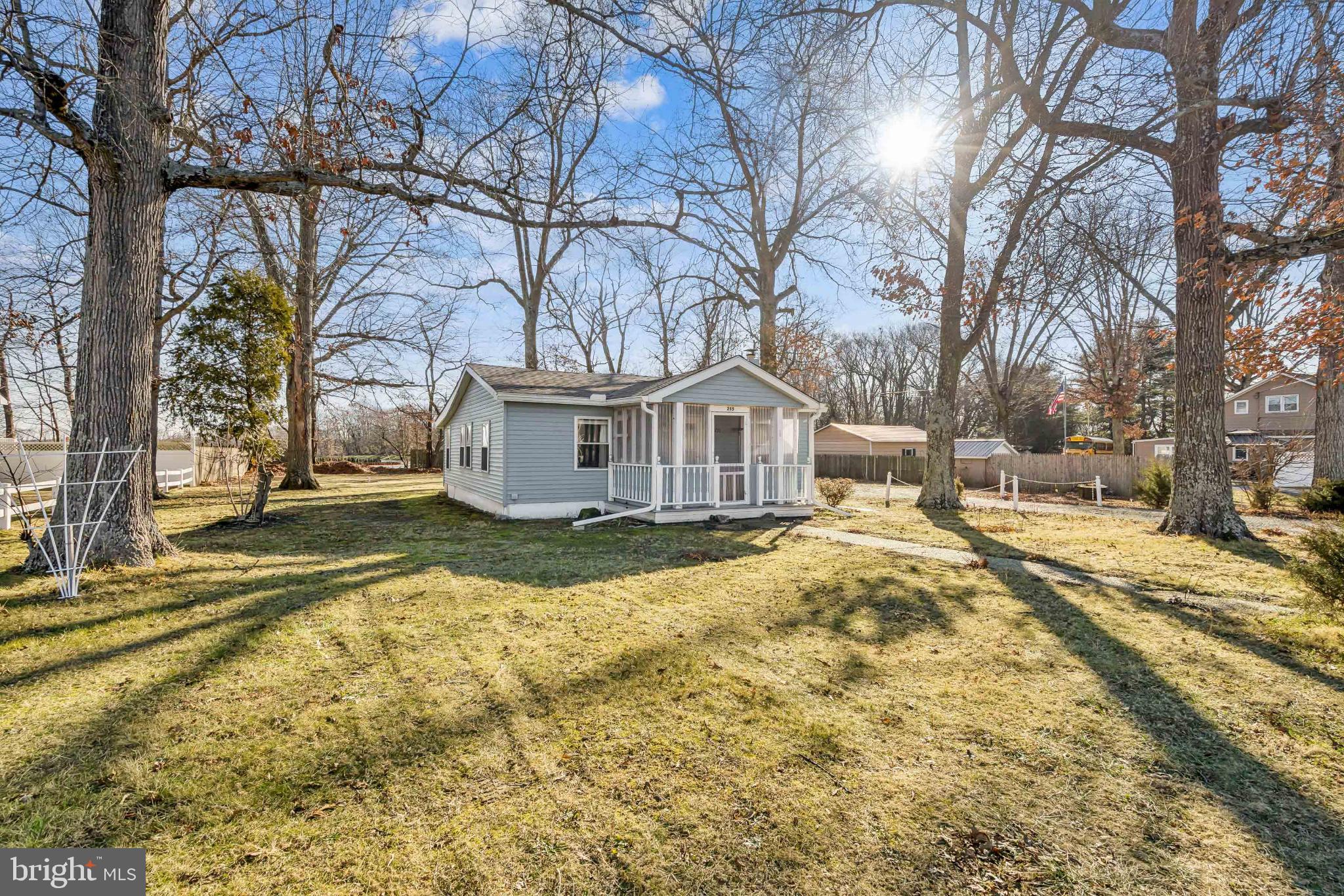 255 South Woodruff Road Bridgeton, NJ 08302 - Photo 2 of 25 a view of a yard with snow on the road