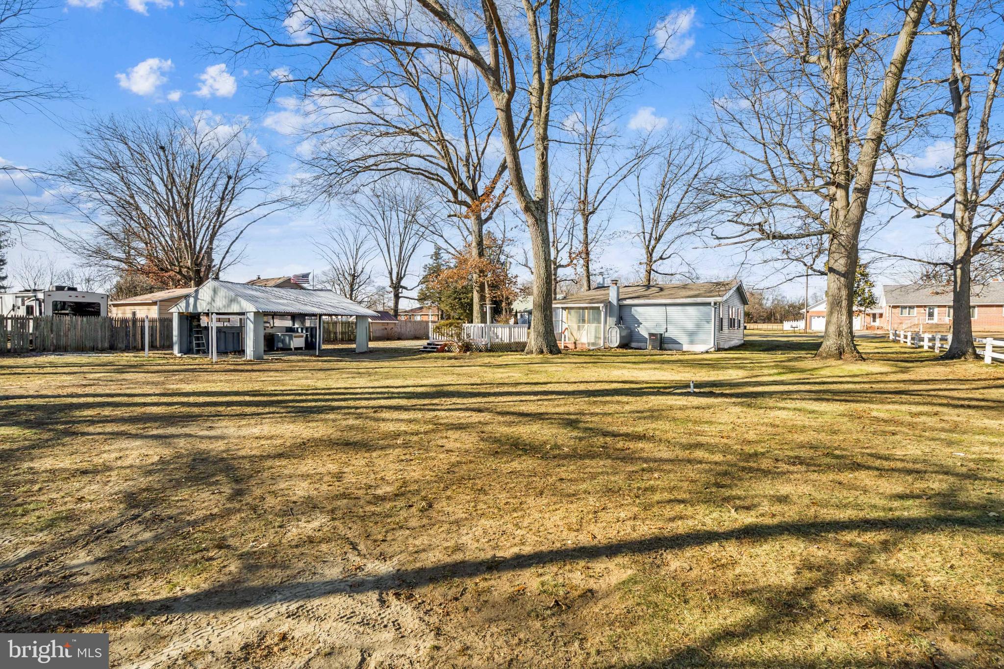 255 South Woodruff Road Bridgeton, NJ 08302 - Photo 24 of 25 a swimming pool with trees in front of it