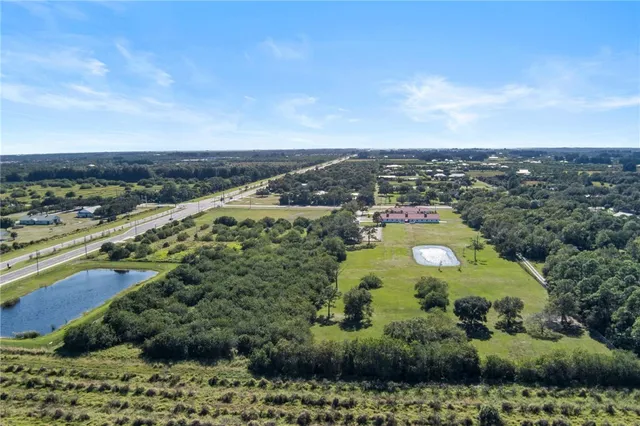 a view of a swimming pool and an outdoor space