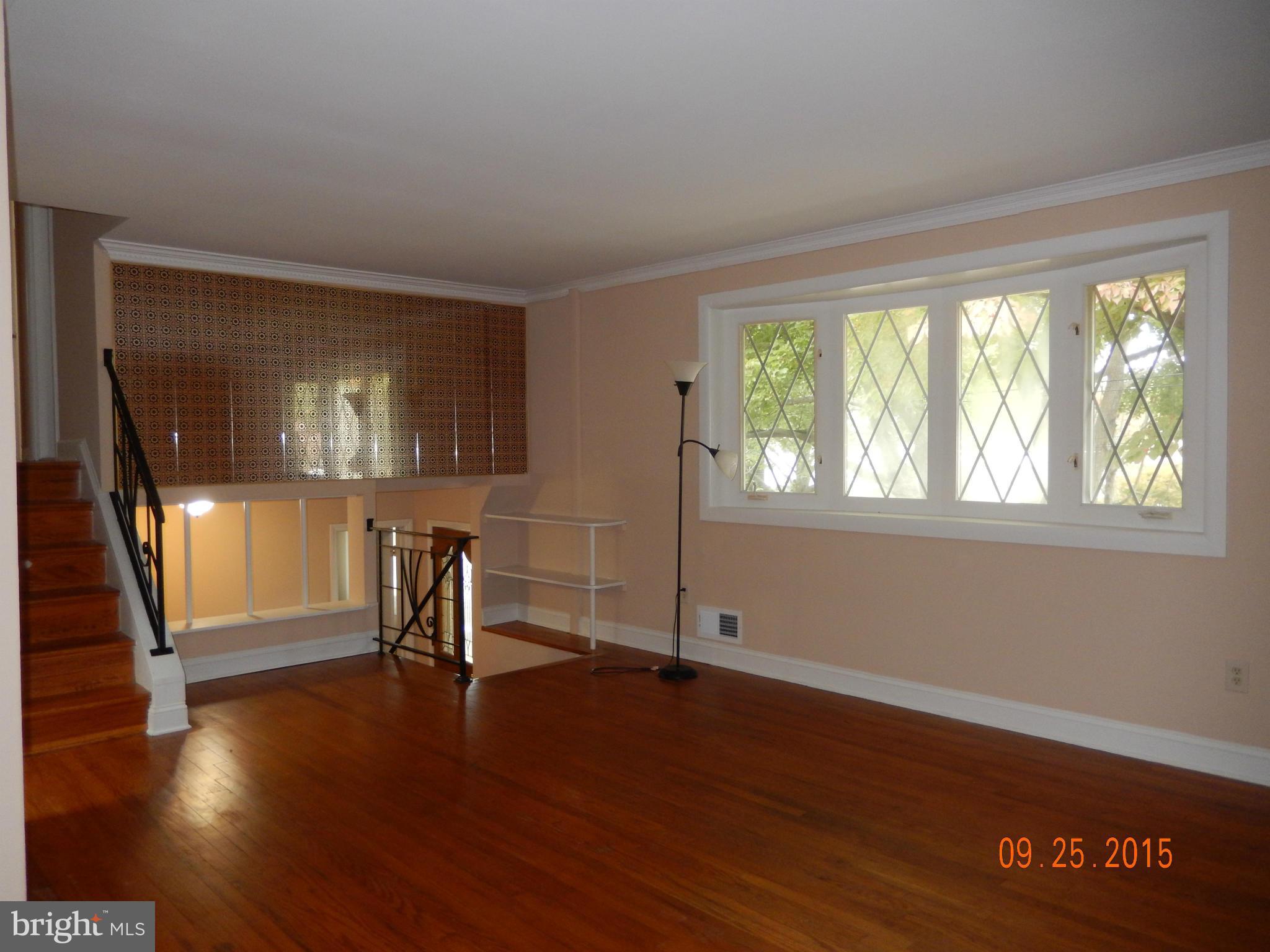 3922 Ilford Road Silver Spring, MD 20906 - Photo 14 of 30 a view of a livingroom with wooden floor and a window