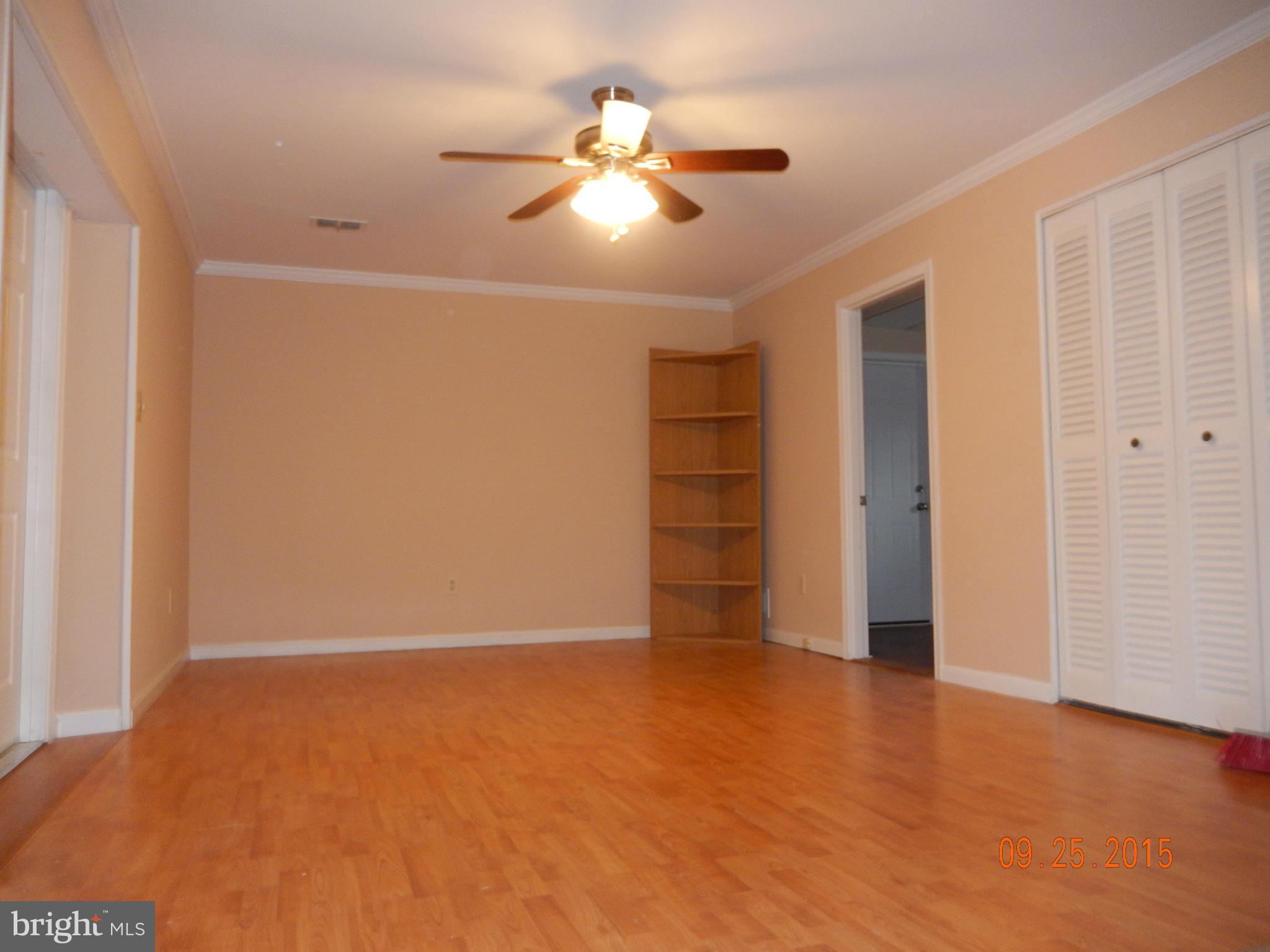 3922 Ilford Road Silver Spring, MD 20906 - Photo 26 of 30 a view of an empty room with a ceiling fan