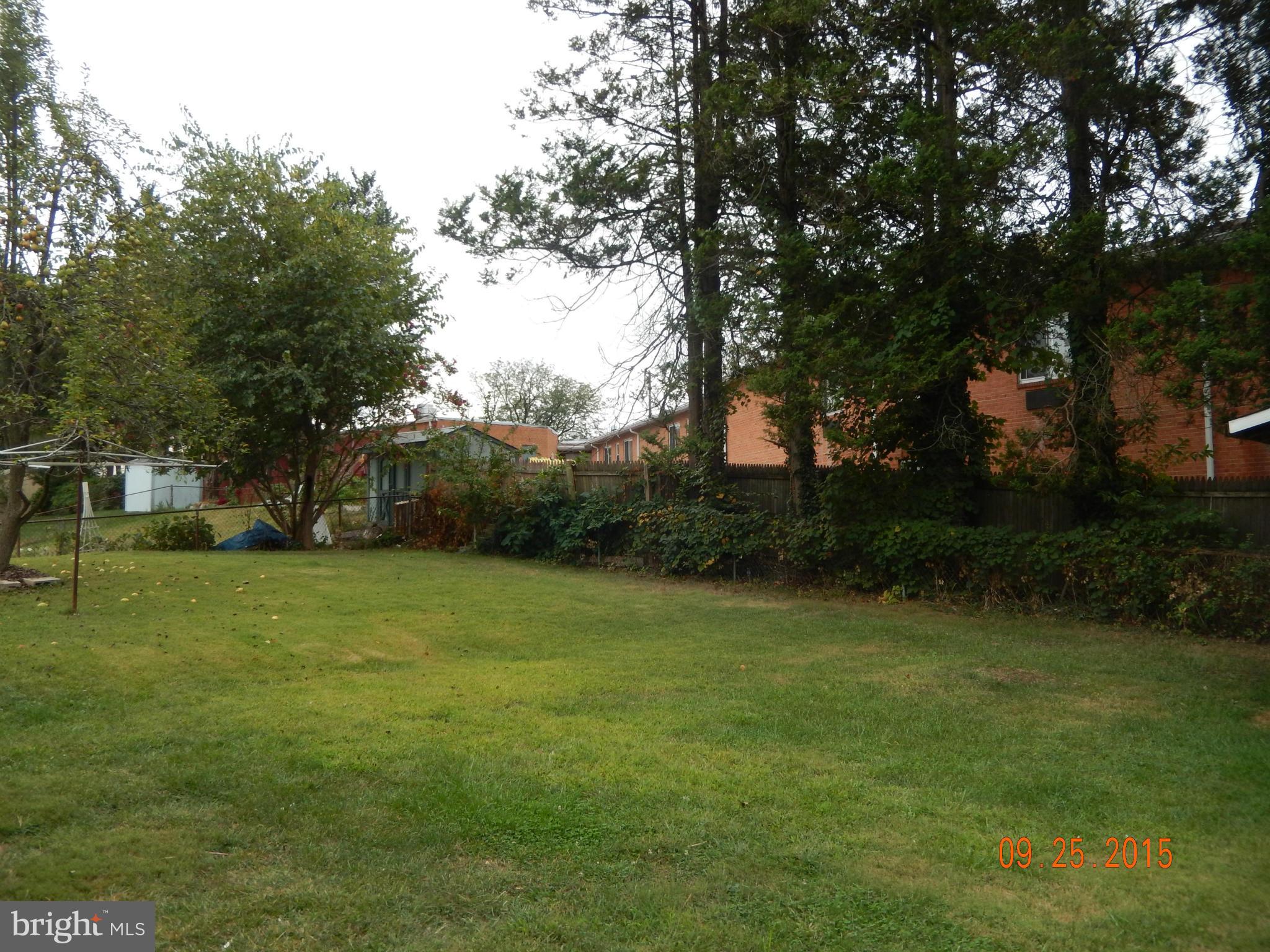 3922 Ilford Road Silver Spring, MD 20906 - Photo 28 of 30 a view of a field of grass and trees