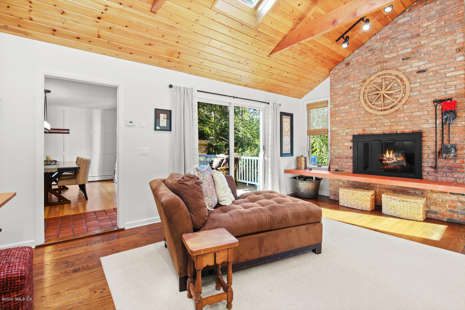 16 Ridge Road Cos Cob, CT 06807 - Photo 15 of 34 a bedroom with furniture and a fireplace