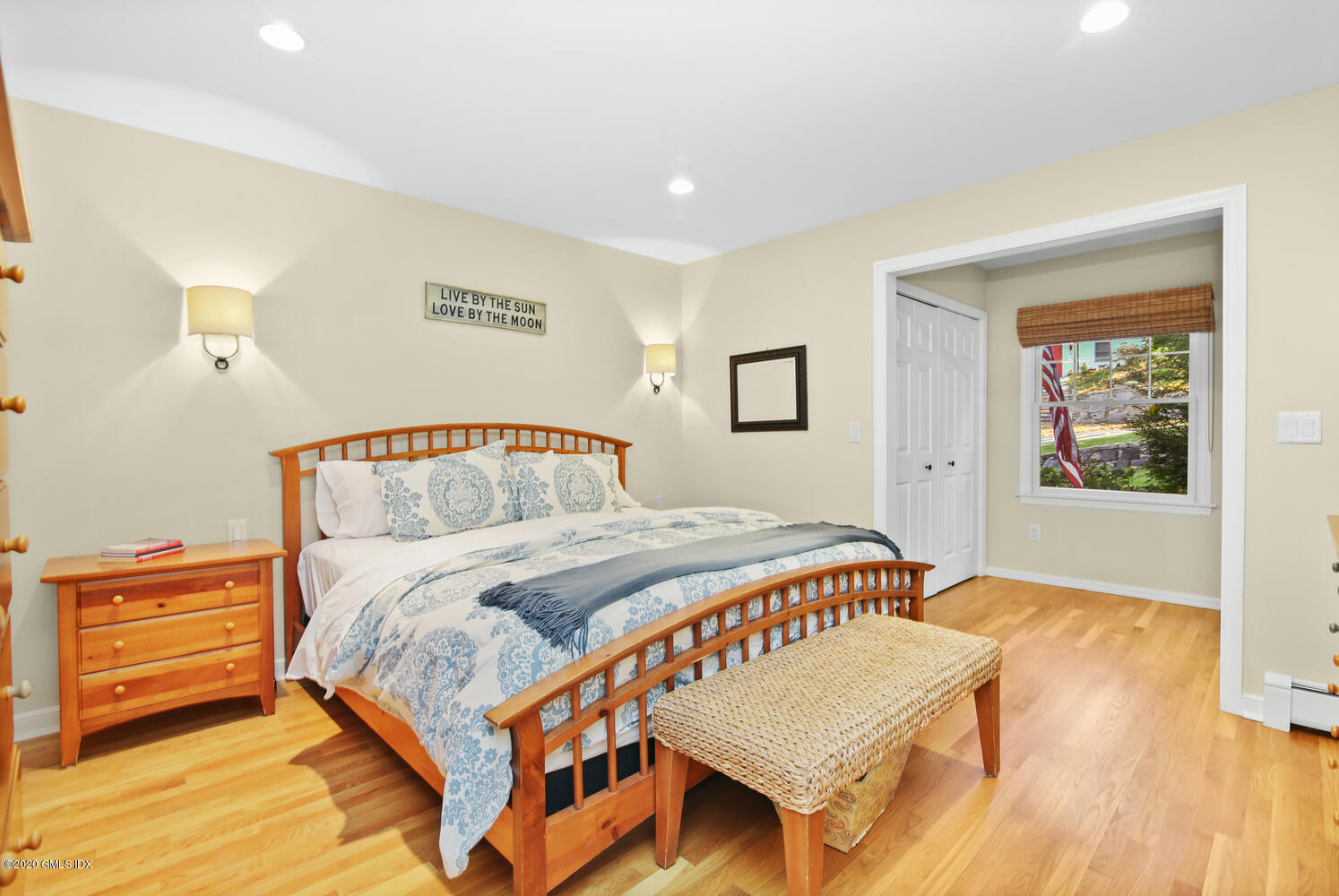 16 Ridge Road Cos Cob, CT 06807 - Photo 18 of 34 a bedroom with a bed and wooden floor