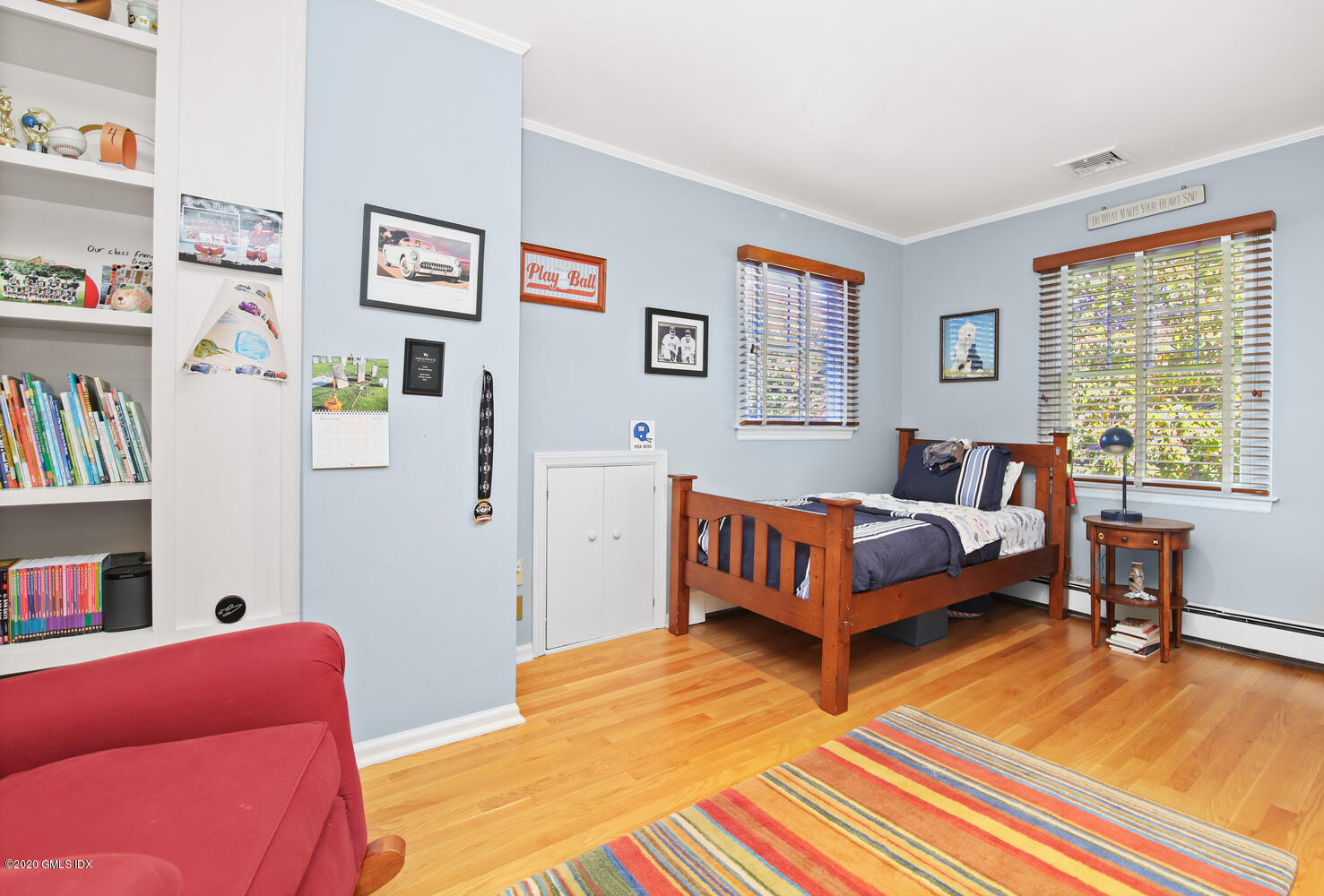 16 Ridge Road Cos Cob, CT 06807 - Photo 20 of 34 a bedroom with a bed and a couch