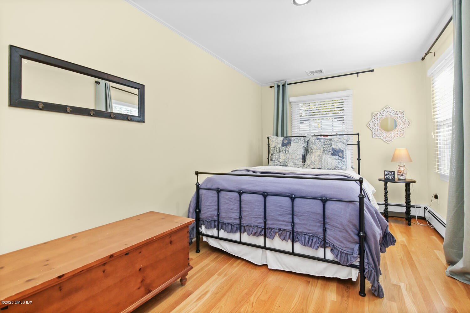 16 Ridge Road Cos Cob, CT 06807 - Photo 22 of 34 a bedroom with a bed and a window