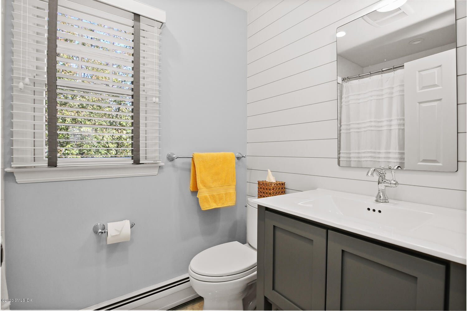 16 Ridge Road Cos Cob, CT 06807 - Photo 23 of 34 a bathroom with a sink a toilet and mirror