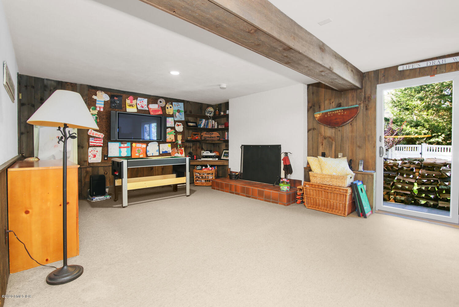 16 Ridge Road Cos Cob, CT 06807 - Photo 24 of 34 a bedroom with furniture and a fireplace