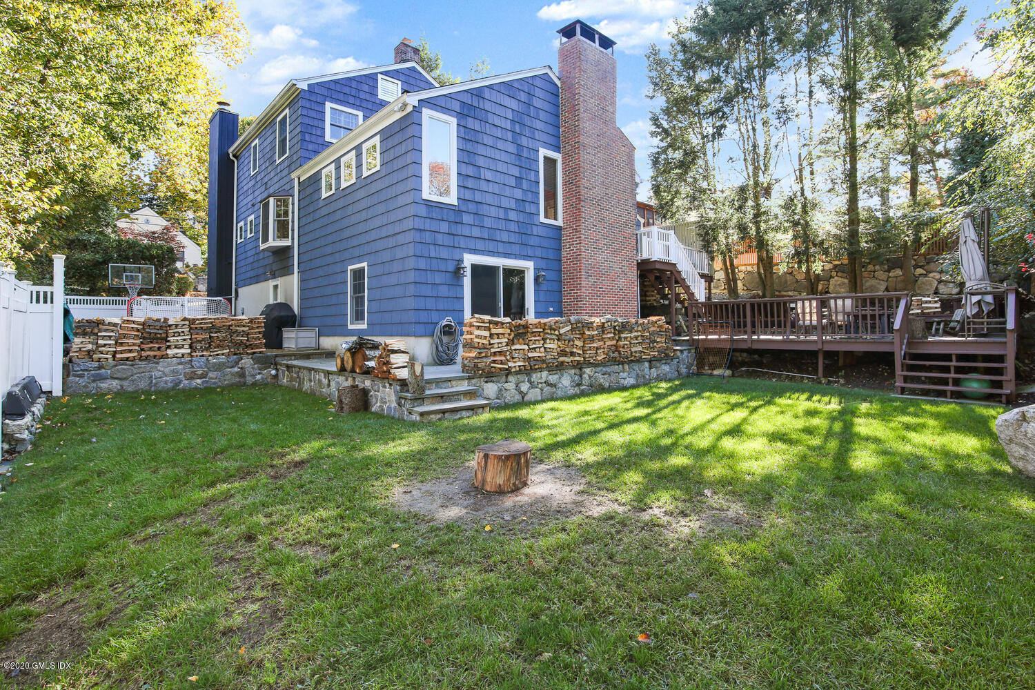 16 Ridge Road Cos Cob, CT 06807 - Photo 27 of 34 a view of a house with a yard and sitting area