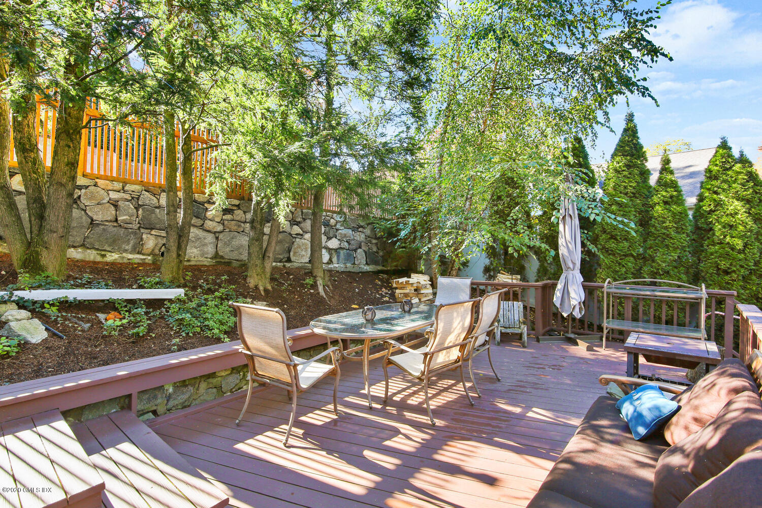 16 Ridge Road Cos Cob, CT 06807 - Photo 30 of 34 a view of a patio with iron fence