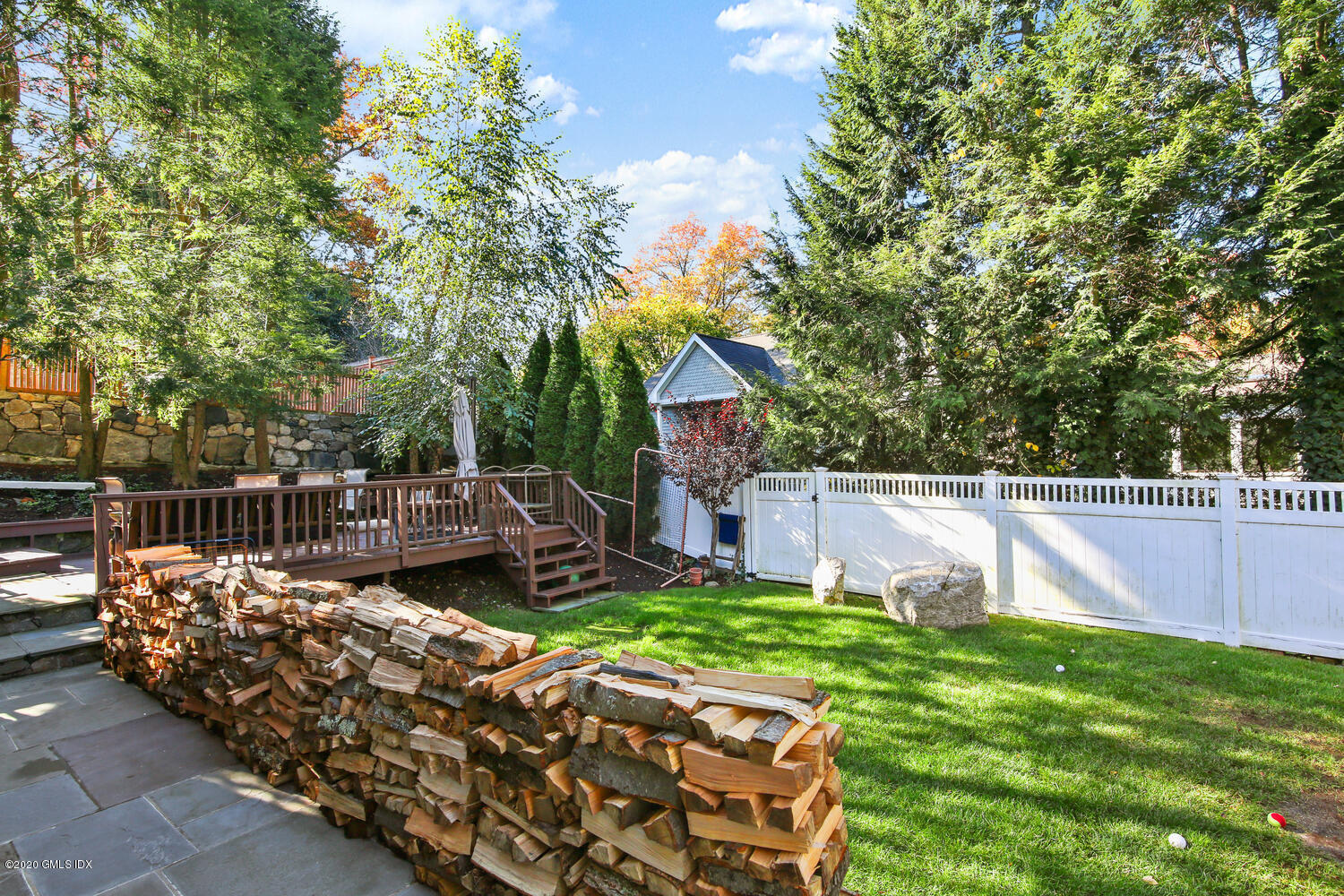 16 Ridge Road Cos Cob, CT 06807 - Photo 31 of 34 a view of a backyard with sitting area