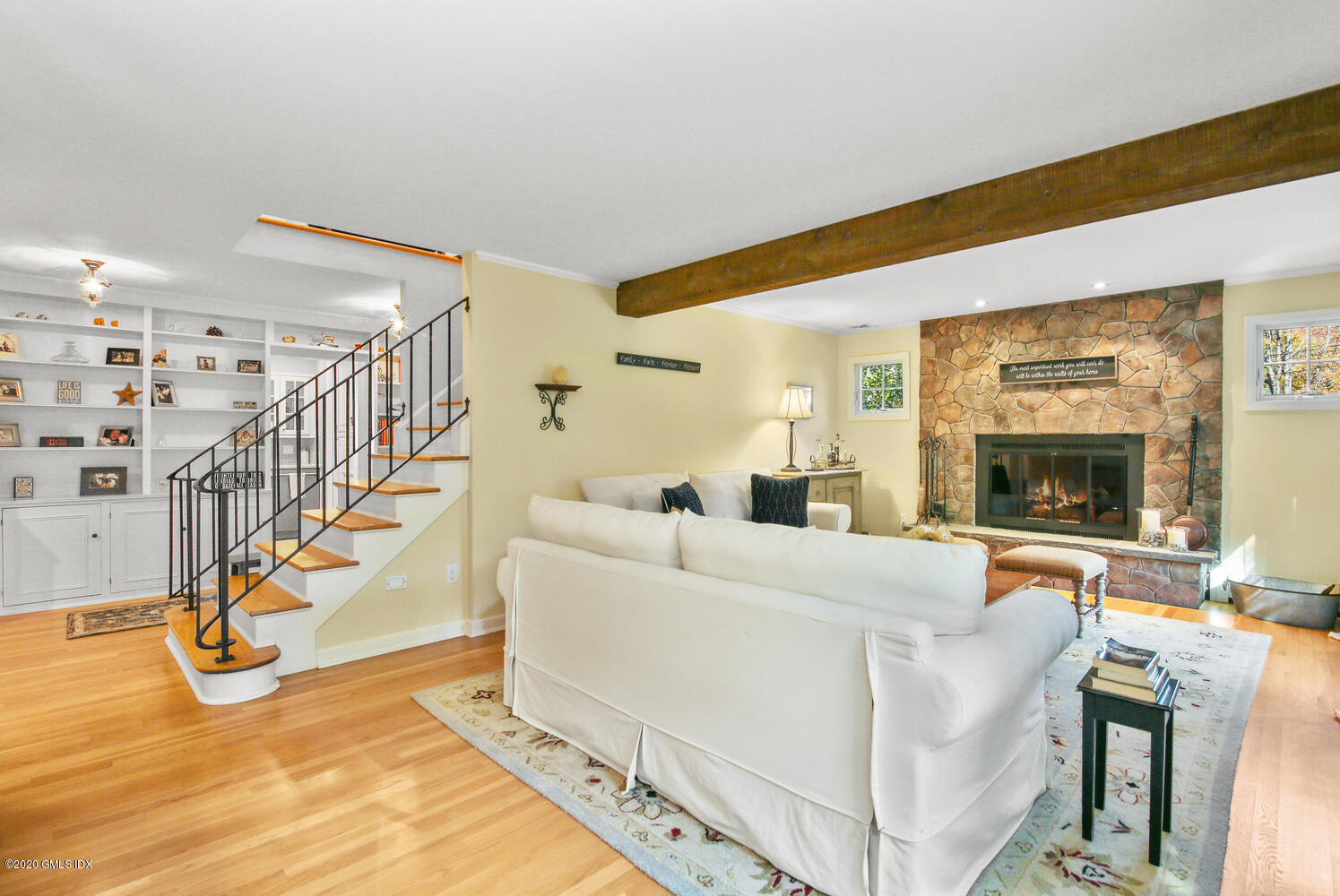 16 Ridge Road Cos Cob, CT 06807 - Photo 5 of 34 a living room with furniture and a fireplace