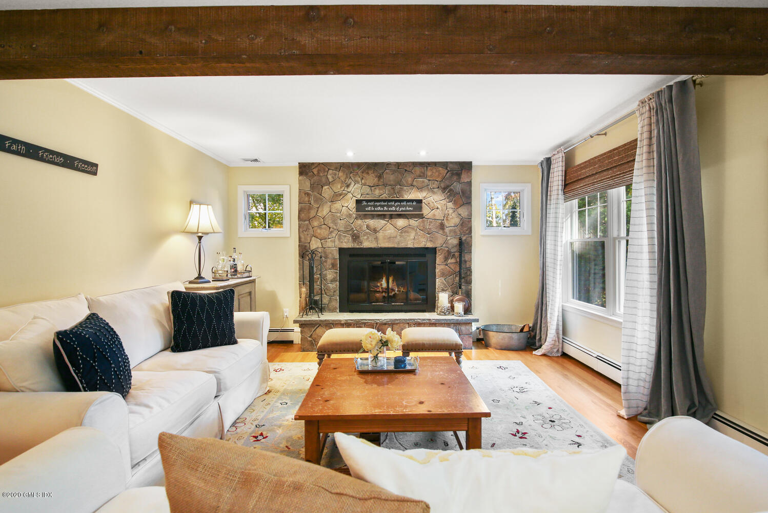 16 Ridge Road Cos Cob, CT 06807 - Photo 6 of 34 a living room with furniture and a fireplace