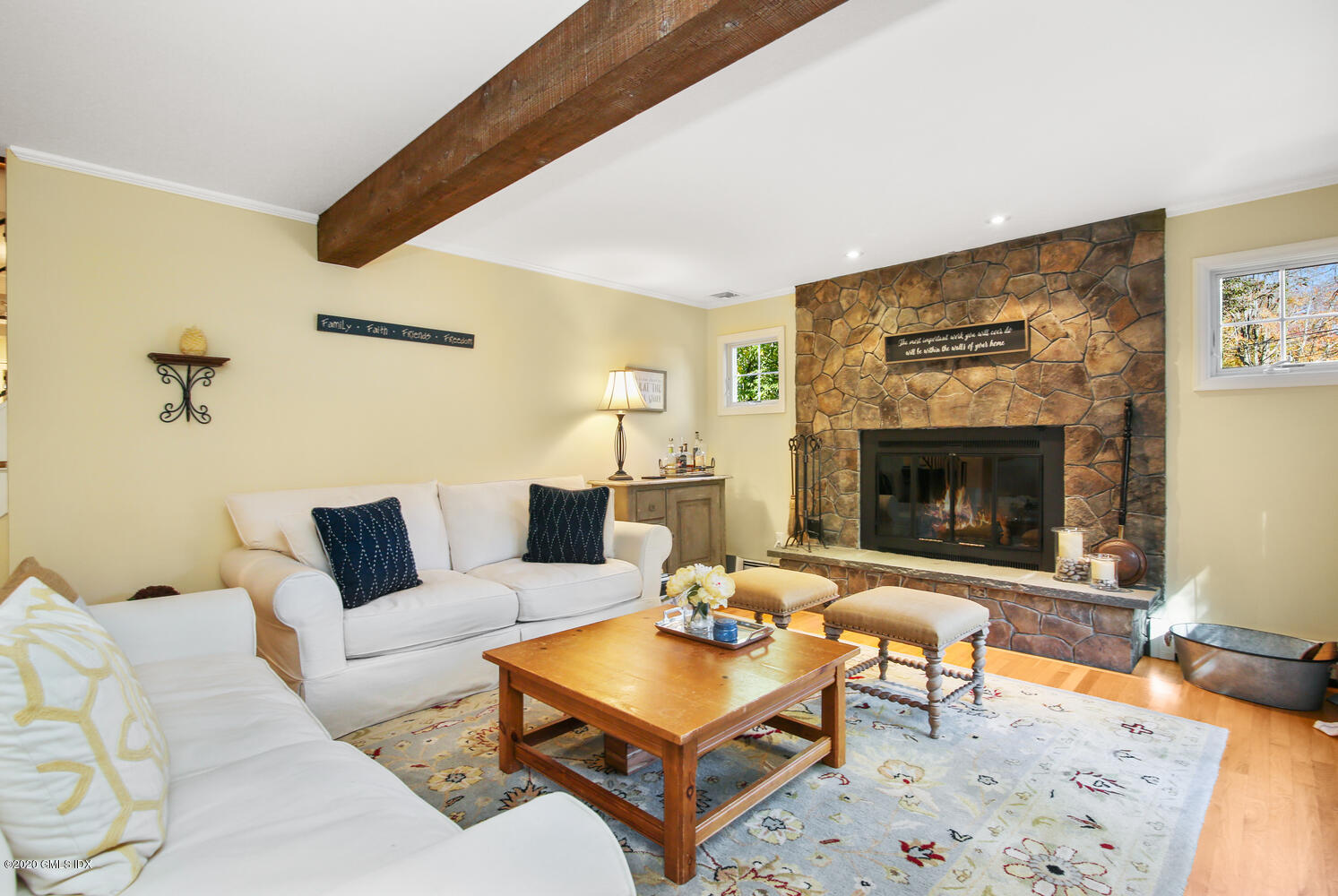 16 Ridge Road Cos Cob, CT 06807 - Photo 7 of 34 a living room with furniture and a fireplace