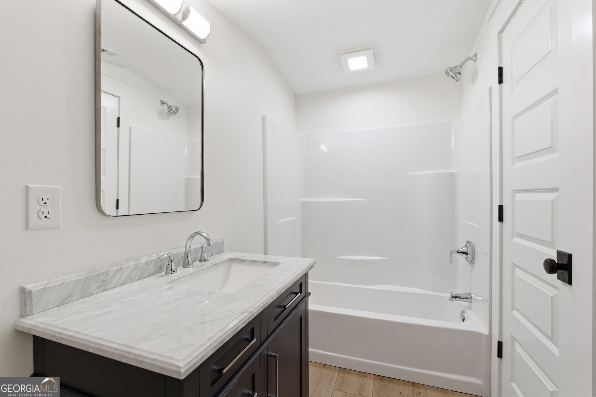 5938 Ridgeway Road Franklin, GA 30217 - Photo 30 of 41 a bathroom with a sink a toilet and shower
