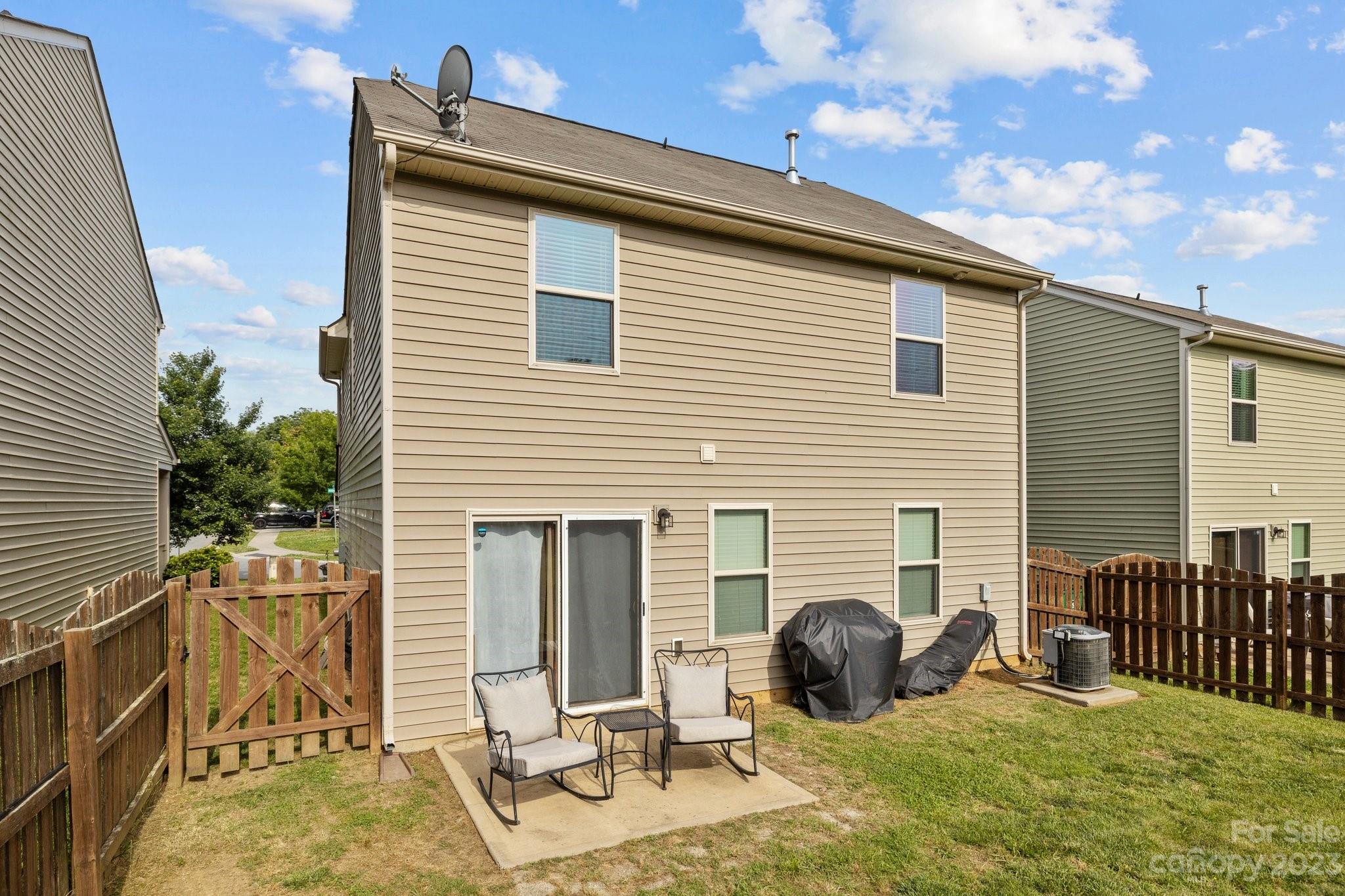 902 Rook Road Charlotte, NC 28216 - Photo 28 of 30 a backyard of a house with seating space