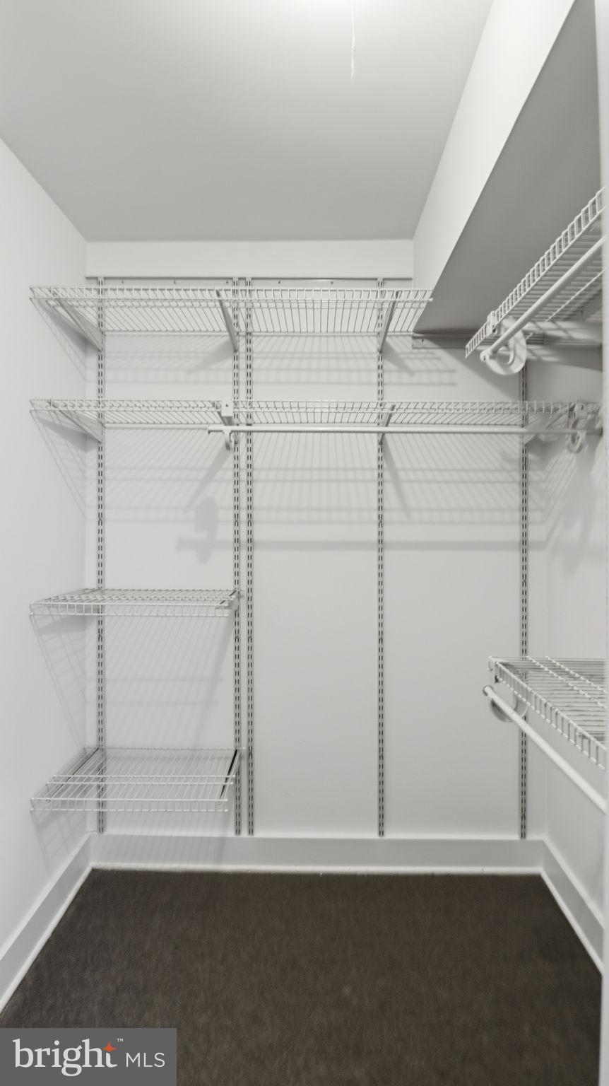 2317 16th Street Southeast, Unit 102 Washington, DC 20020 - Photo 12 of 23 a view of a room with racks on the wall