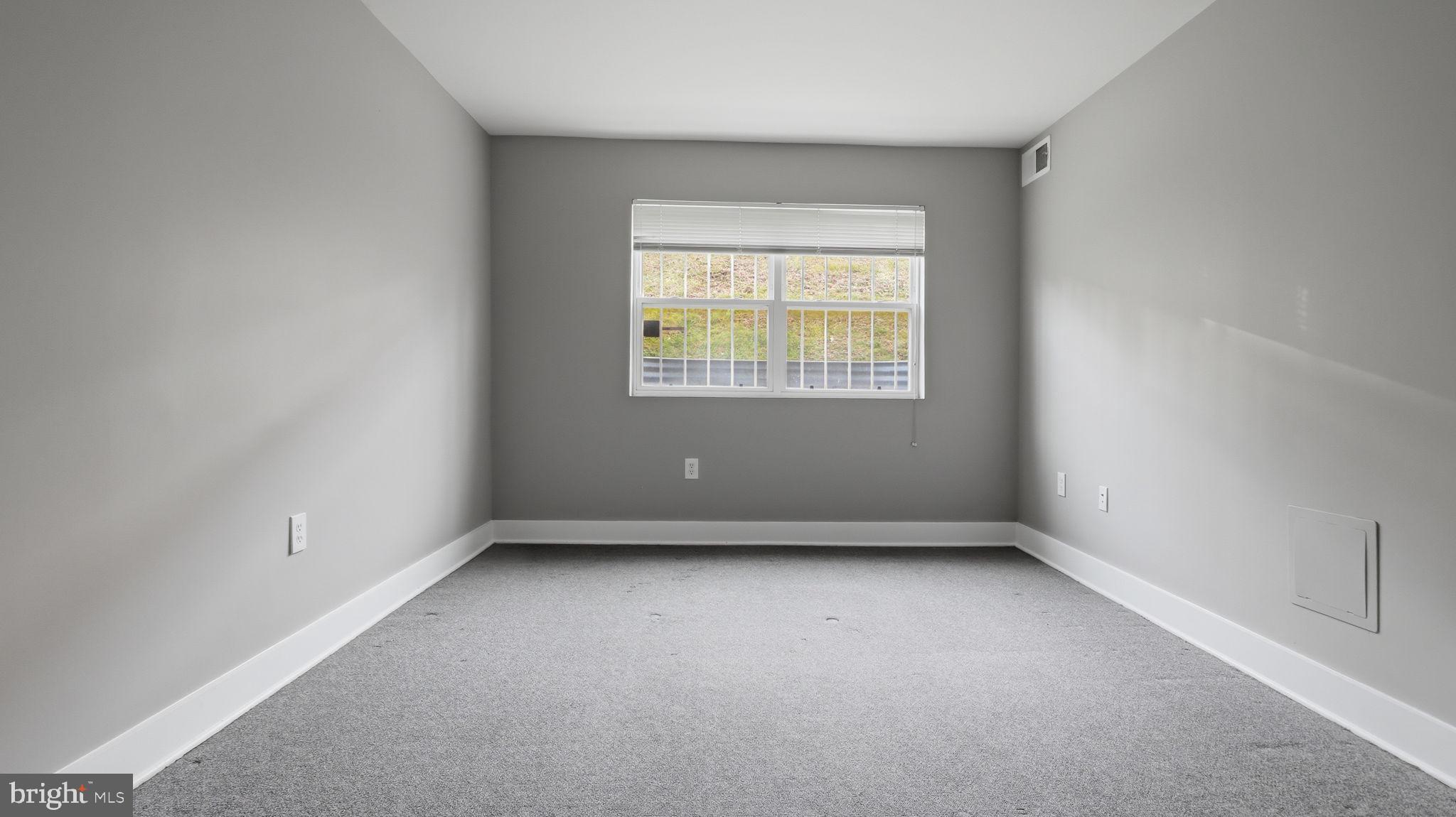 2317 16th Street Southeast, Unit 102 Washington, DC 20020 - Photo 15 of 23 an empty room with a window
