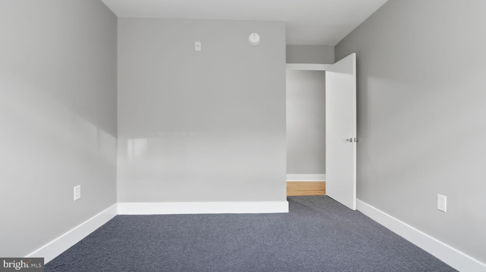 2317 16th Street Southeast, Unit 102 Washington, DC 20020 - Photo 18 of 23 a view of an empty room