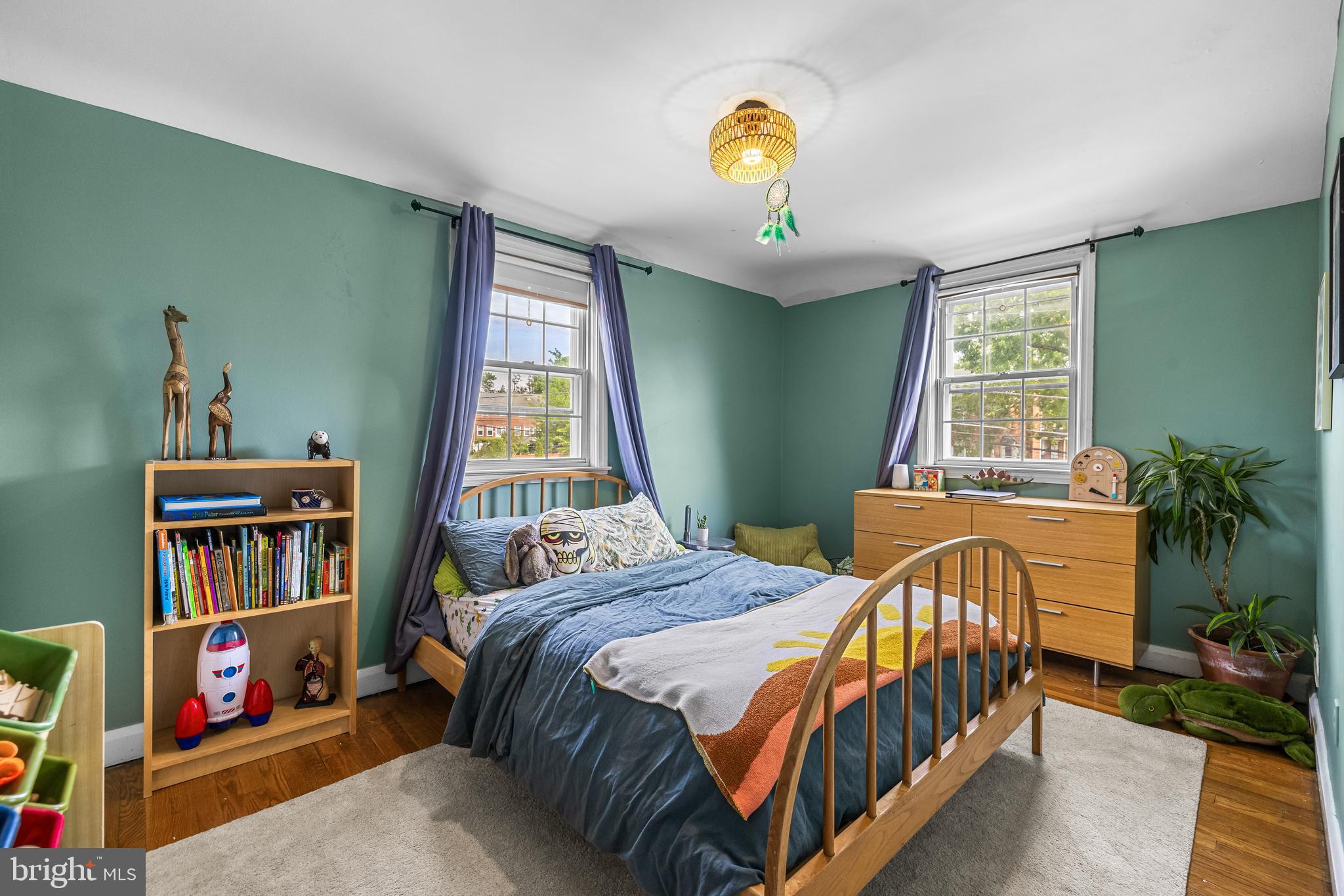 1620 Hardwick Road Towson, MD 21286 - Photo 21 of 38 a bedroom with a bed and a book shelf