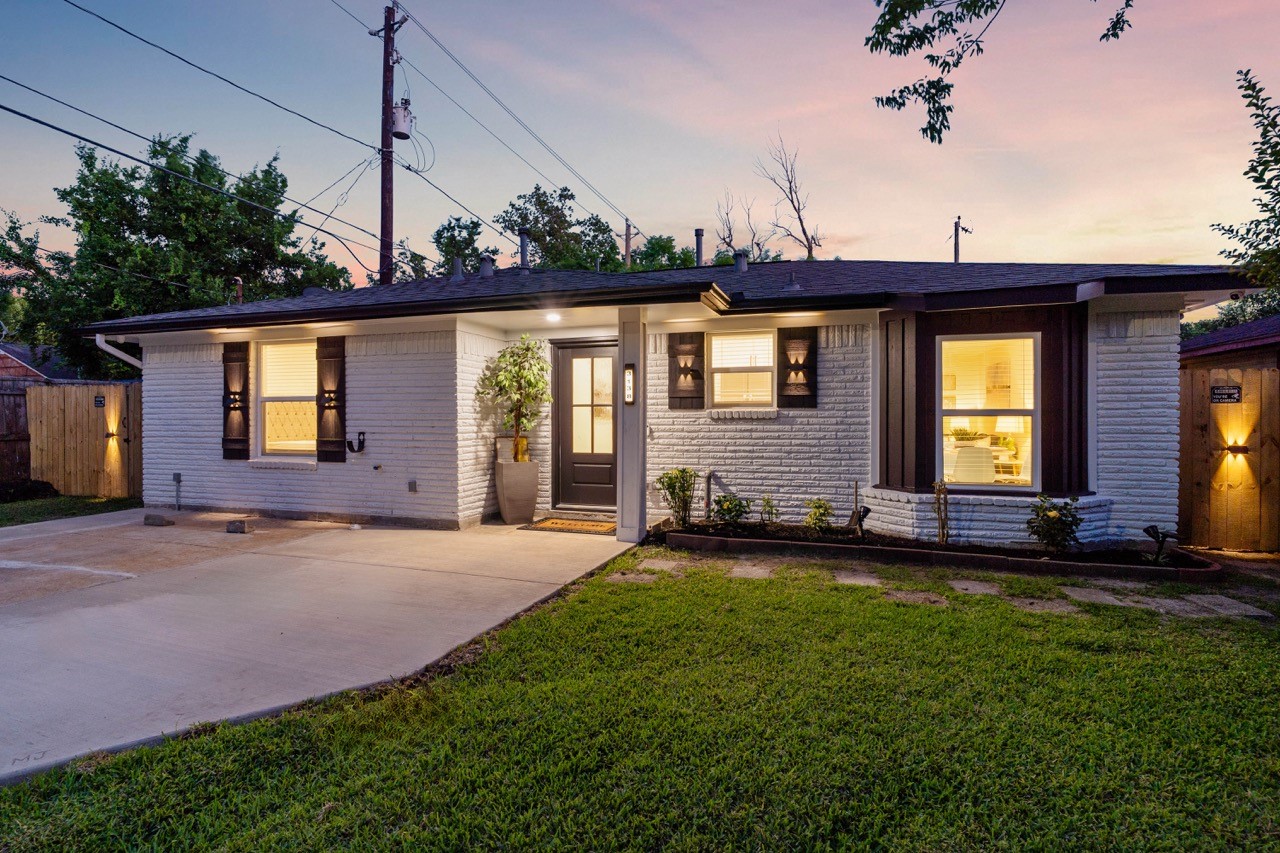 3138 Sunbeam Street Houston, TX 77051 - Photo 1 of 50 Freshly painted brick, designer lighting, and clean modern lines create a warm, elevated first impression that feels straight out of a luxury magazine spread.