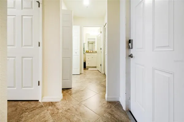 a view of a bathroom with white walls
