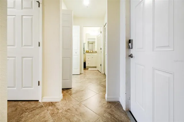 a view of a bathroom with white walls
