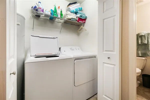 a bathroom with a sink a toilet and bathtub