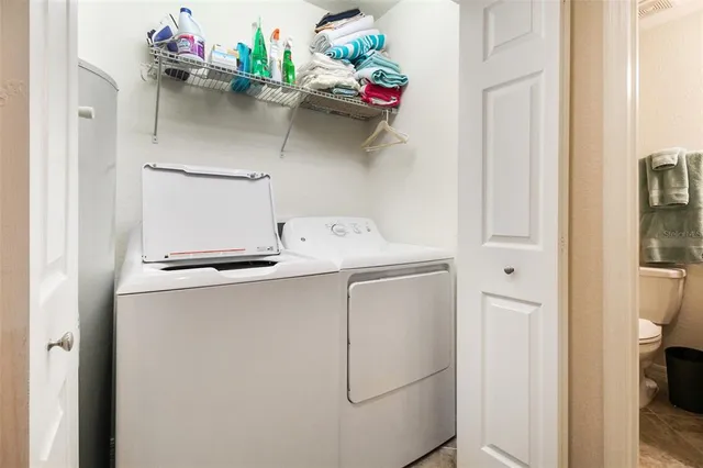 a bathroom with a sink a toilet and bathtub