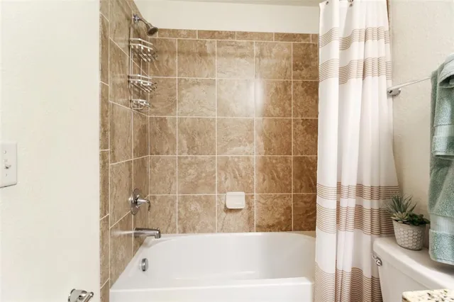 a view of a hallway with a white walls