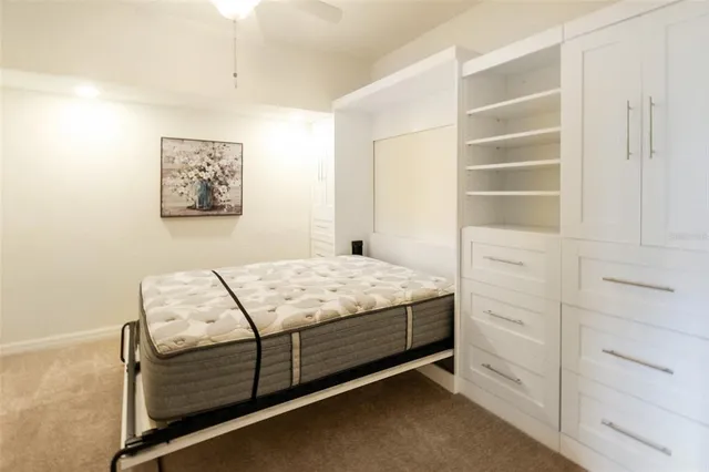 a view of a room with a table and a chair