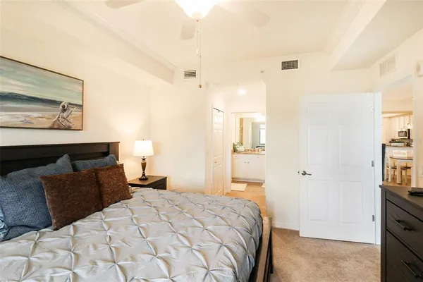 a view of a bathroom with a sink and a mirror