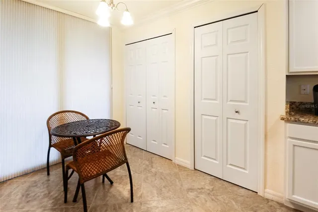 a view of a room with table and chair