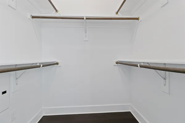 a view of small space with racks on the wall