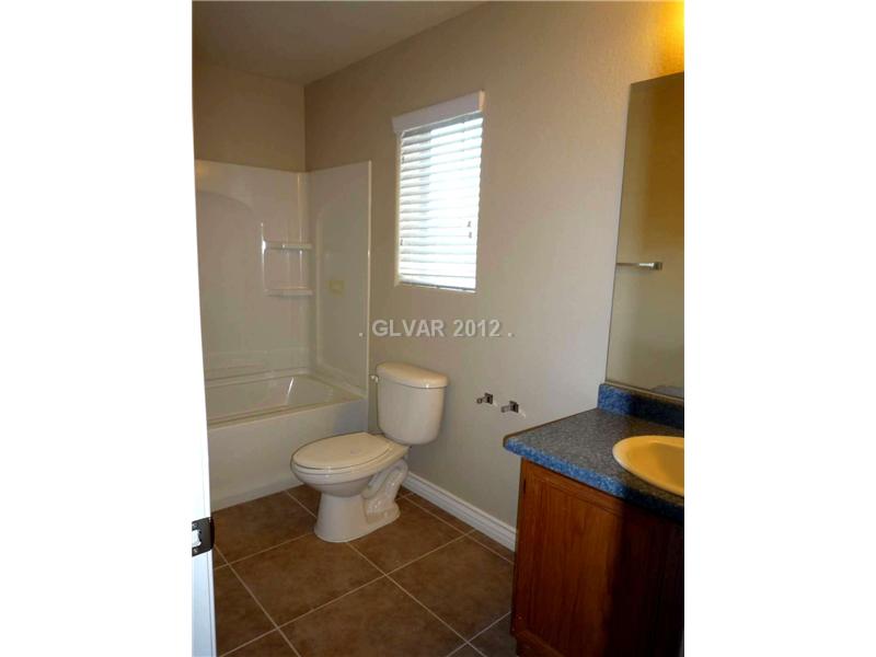 75 Lockheed Avenue Las Vegas, NV 89183 - Photo 17 of 24 Property Photo. Hallway bath - new tile!