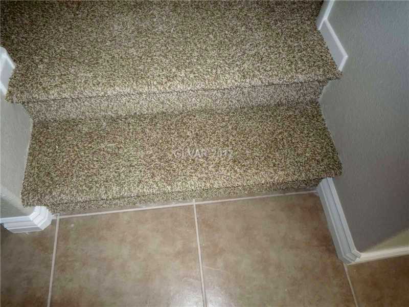 Property Photo. New CARPET, TILE and baseboards
