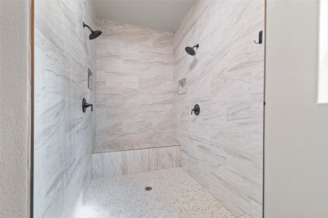 207 South Charles Street George West, TX 78022 - Photo 24 of 24 a bathroom with a shower