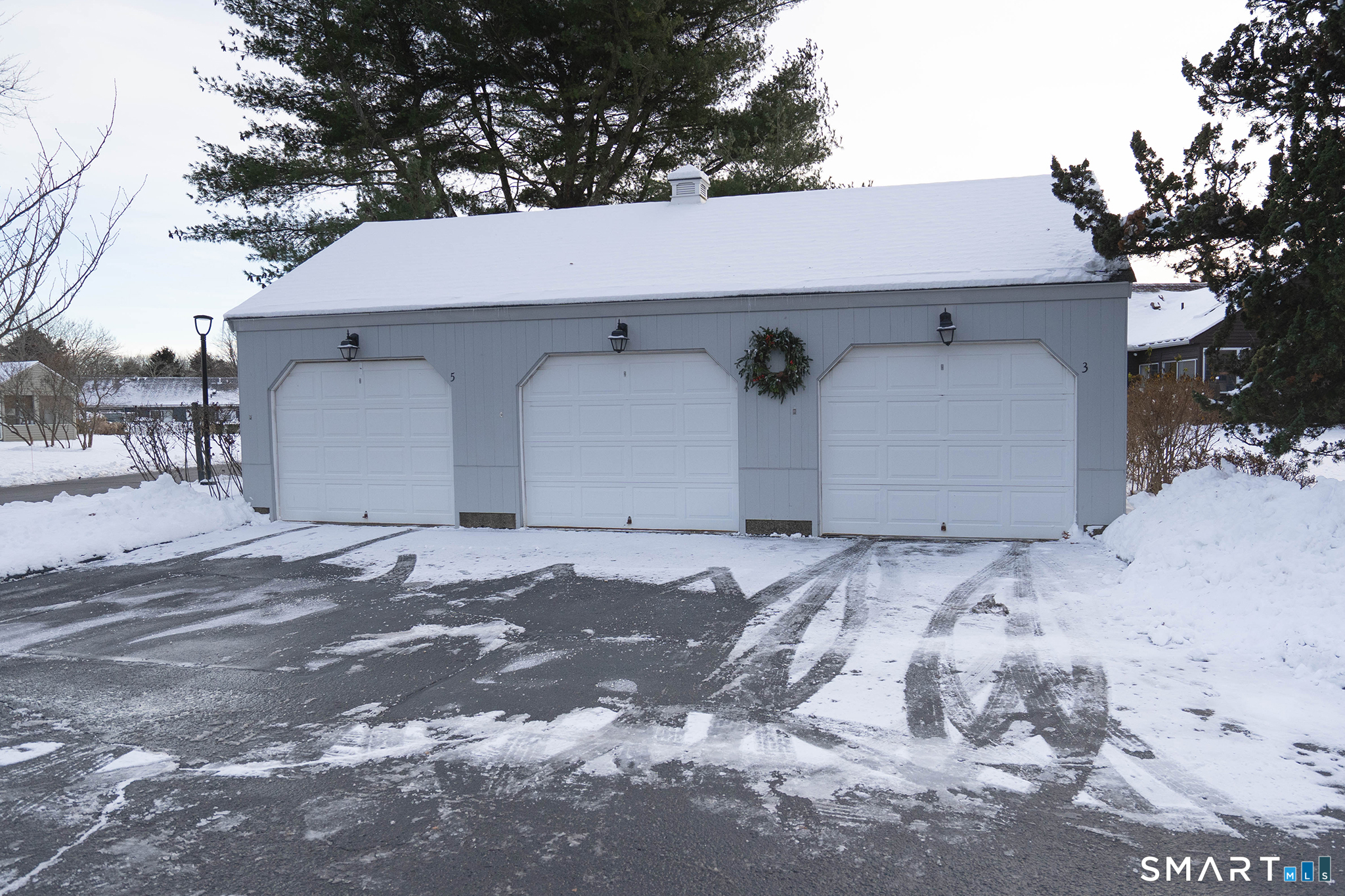 4 Currycross Road, Unit 4 Madison, CT 06443 - Photo 28 of 29 a view of a house with a yard and garage