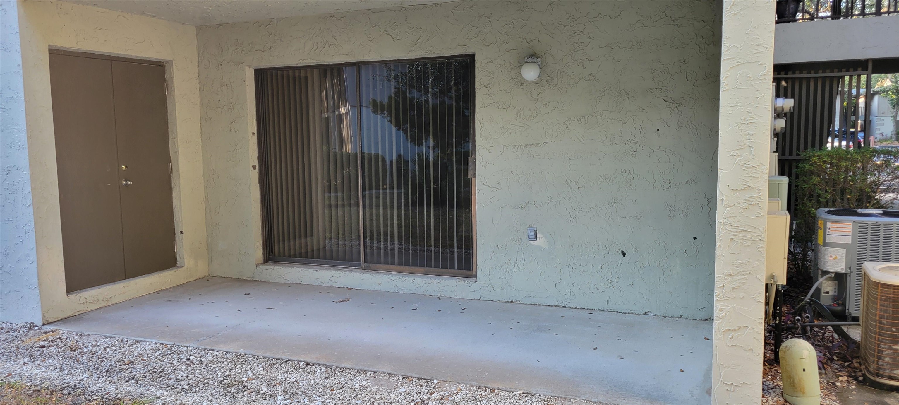 5 Catalonia Court St. Augustine, FL 32086 - Photo 22 of 30 Doorway to property featuring stucco siding