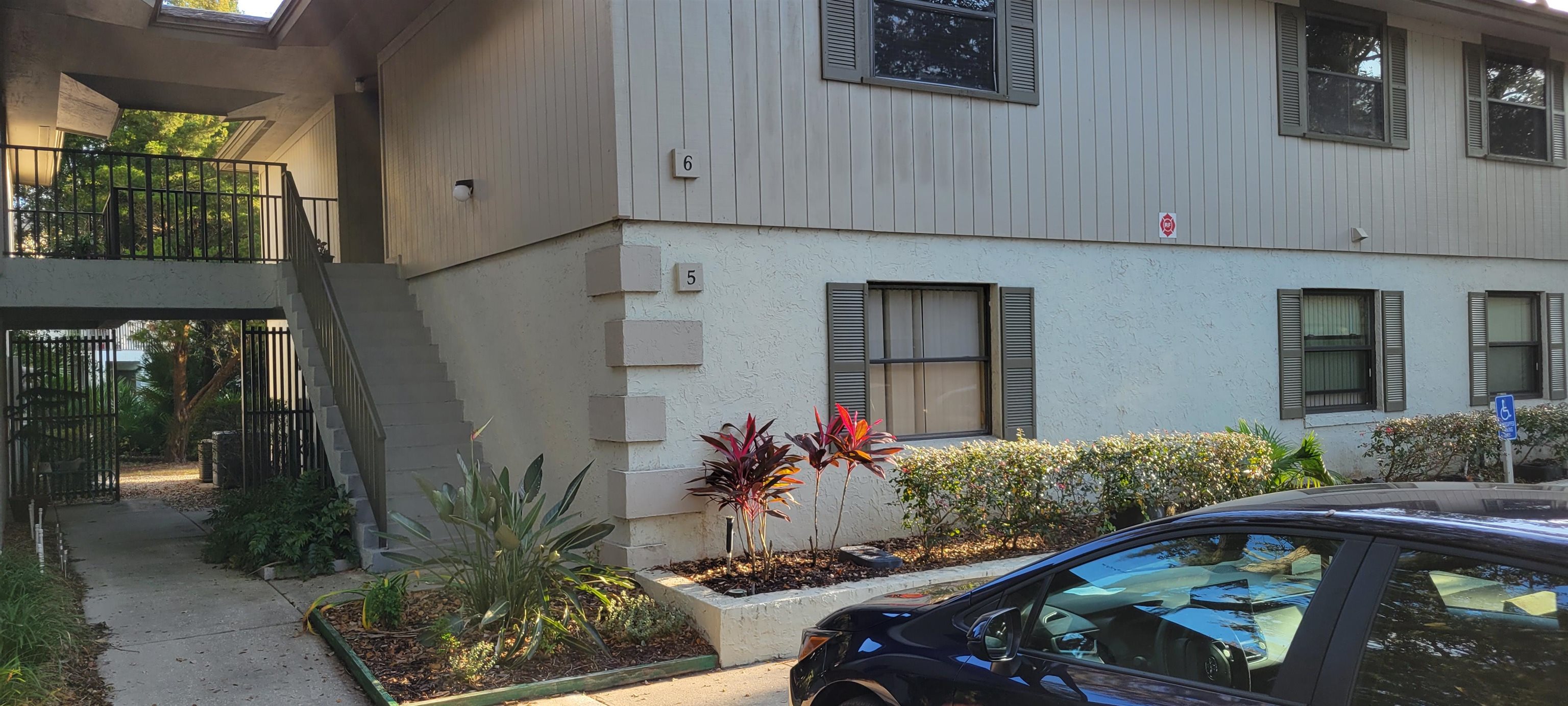 5 Catalonia Court St. Augustine, FL 32086 - Photo 3 of 30 View of side of home with stairs