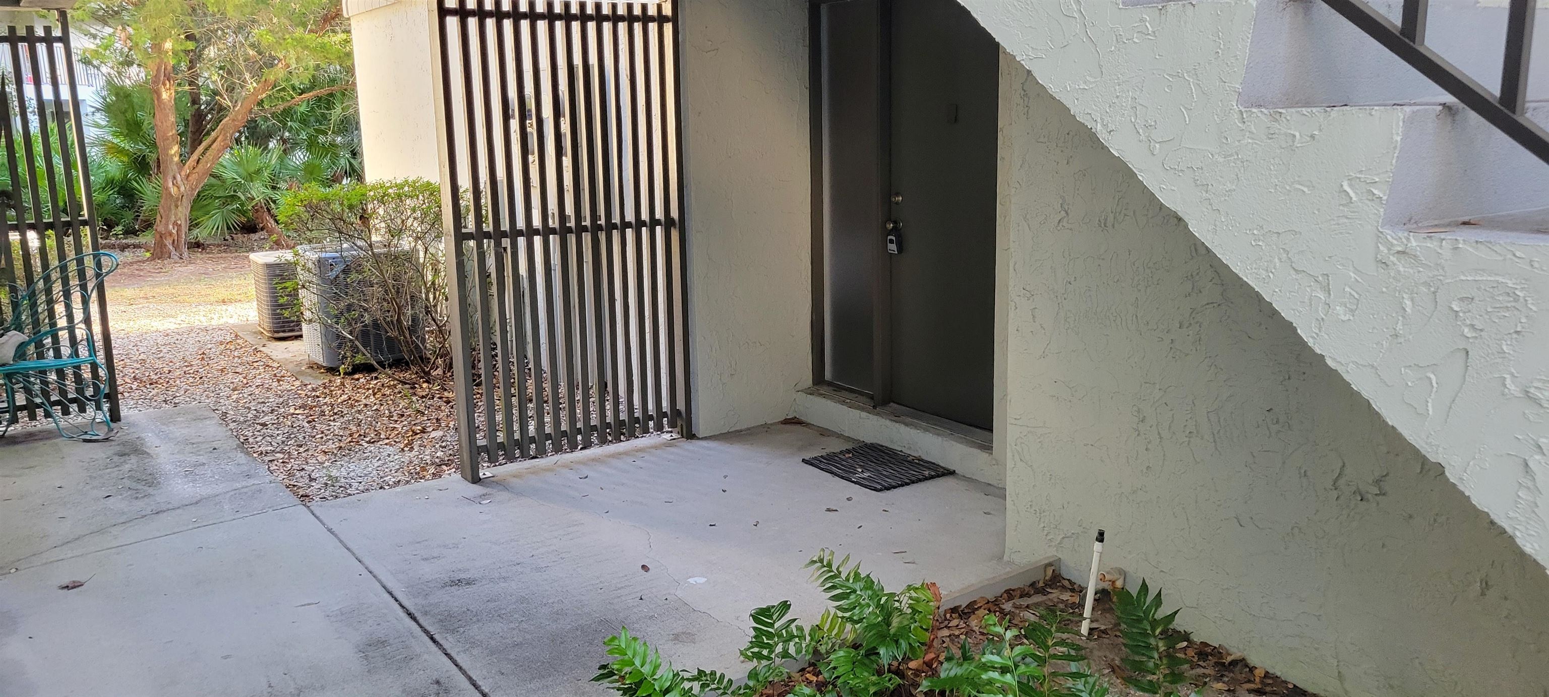 5 Catalonia Court St. Augustine, FL 32086 - Photo 4 of 30 Property entrance with stucco siding