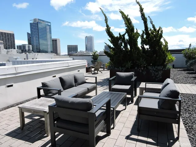 a view of a chairs and table in the patio