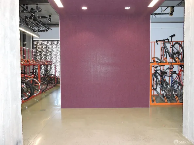 a bathroom with a mirror and a shower