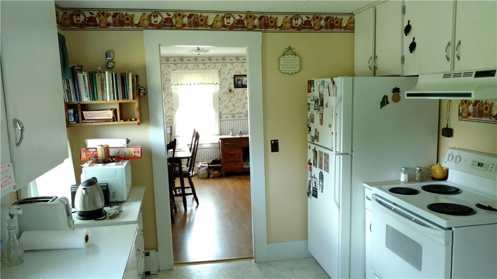 664 Farmington Falls Road Farmington, ME 04938 - Photo 5 of 18 Kitchen looking to dining room.
